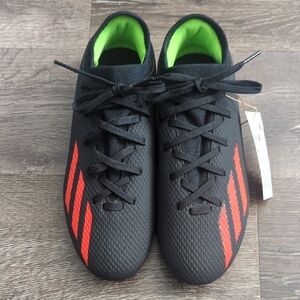 Adidas Black Soccer Cleats with Red Stripes and Neon Green Lining